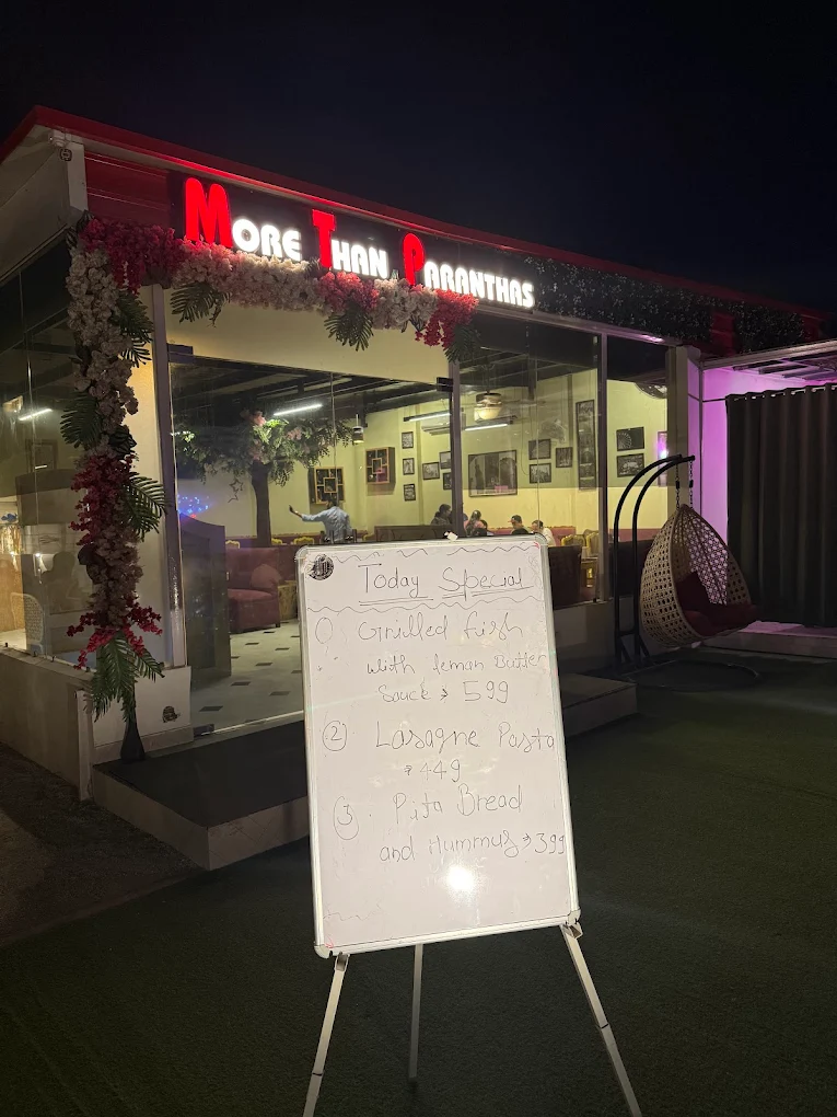 More Than Paranthas storefront at night